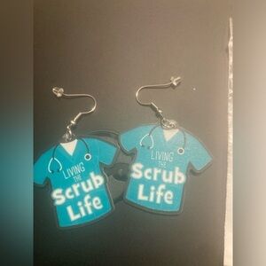 4/$25 Nurse/Doctor living the scrub life earrings. In a greenish/blue color
